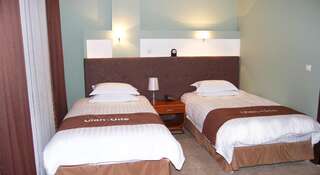 Гостиница Резиденция Улан-Удэ Стандартный двухместный номер с 2 отдельными кроватями-3